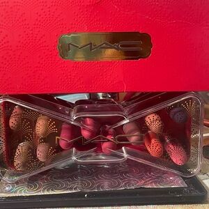 Mac Celebrate in color with this powder kiss bow vault.New